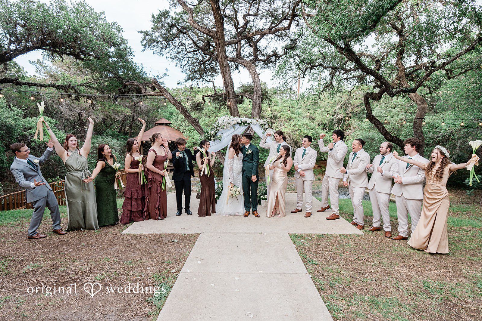 Gavin + Kayleigh Our San Antonio wedding photographers captured a romantic portrait of the couple and their bridal party