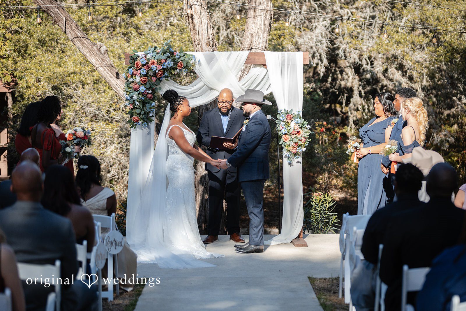 Couple standing hands in hands for ceremony