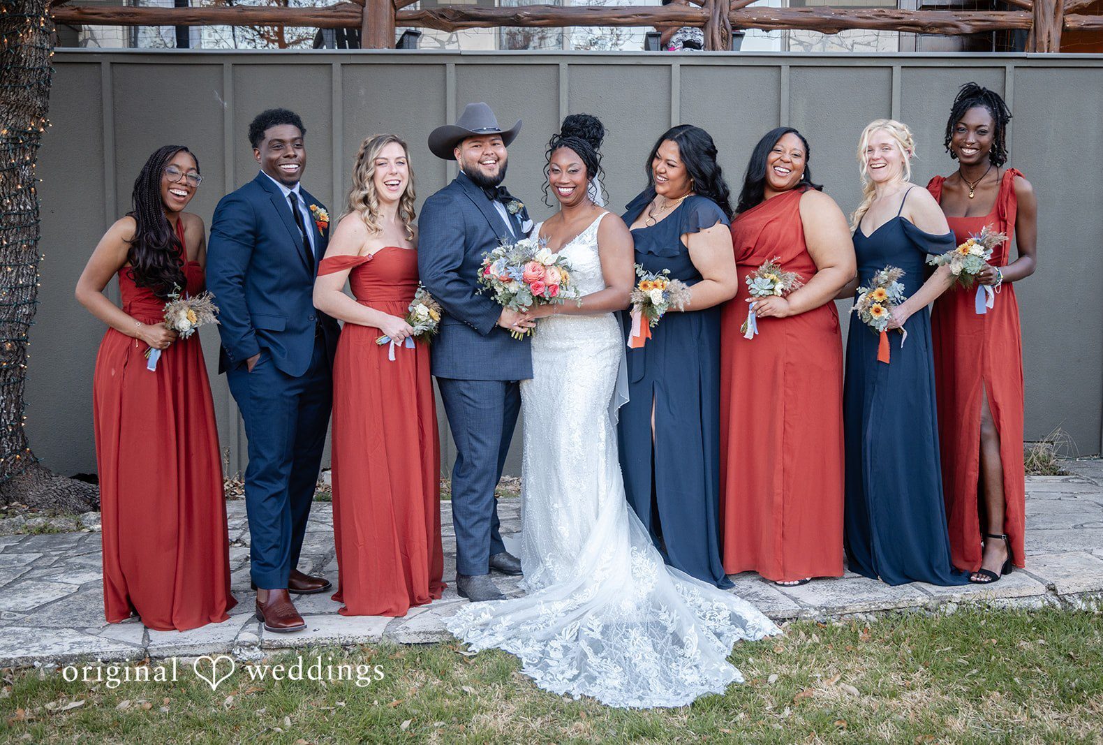 Couple's photo with bridesmaids and groomsmen at Scenic Springs by San Antonio wedding photographers from original weddings