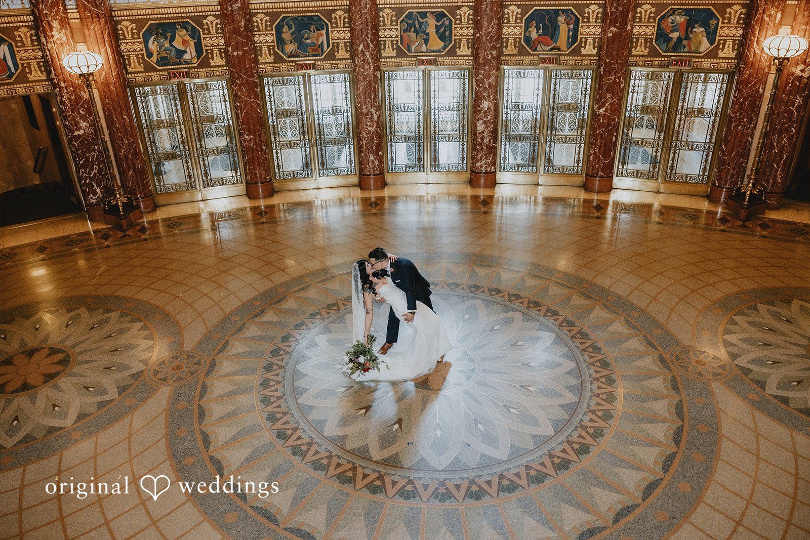 Daniel + Erica Wide portrait of the couple inside the wedding venue