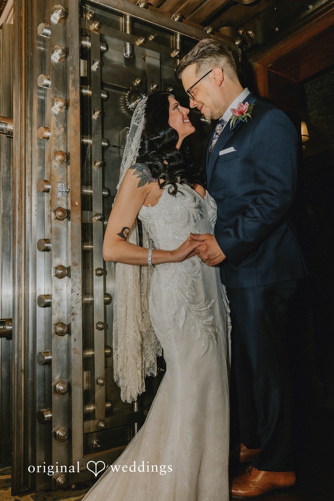 Daniel + Erica Bride and groom embracing during romantic wedding portraits