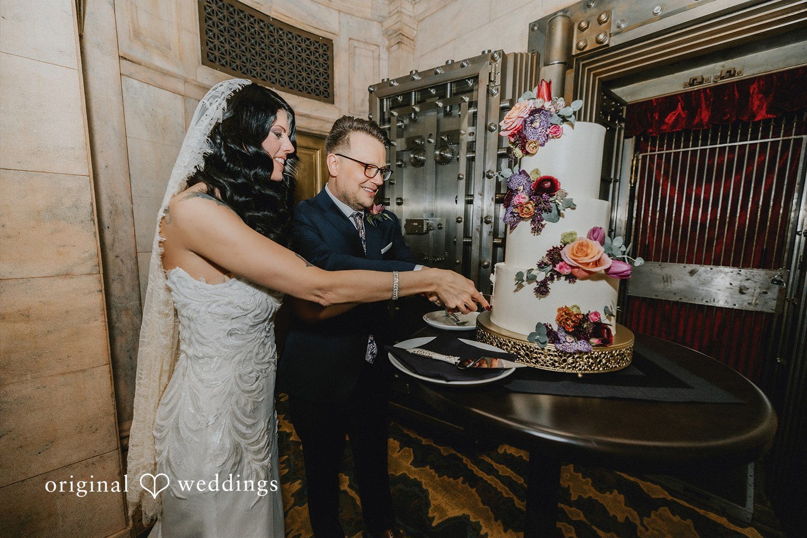Daniel + Erica Couple cutting their wedding cake during the reception