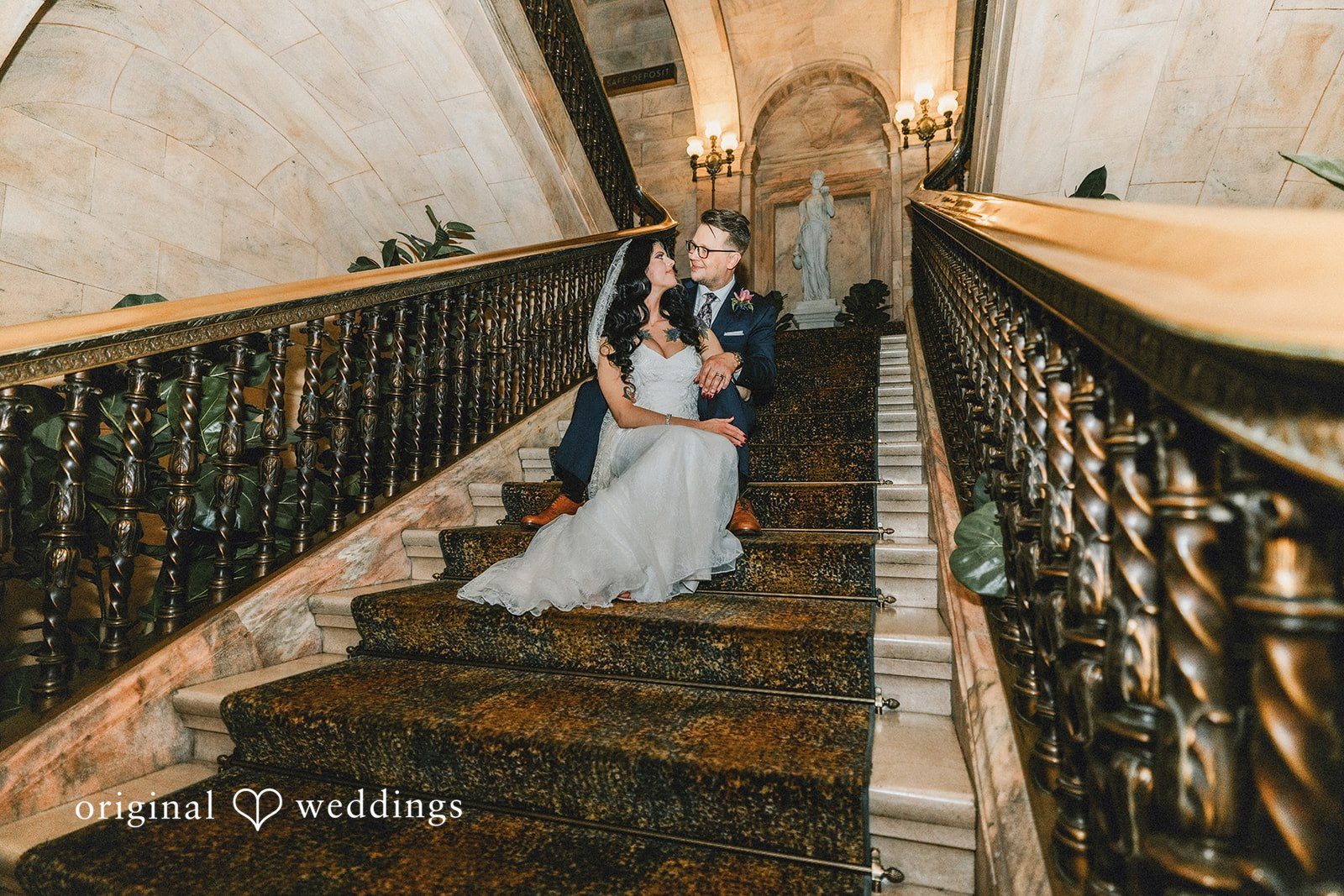 Daniel + Erica Bride and groom sitting on the staircase during wedding portraits