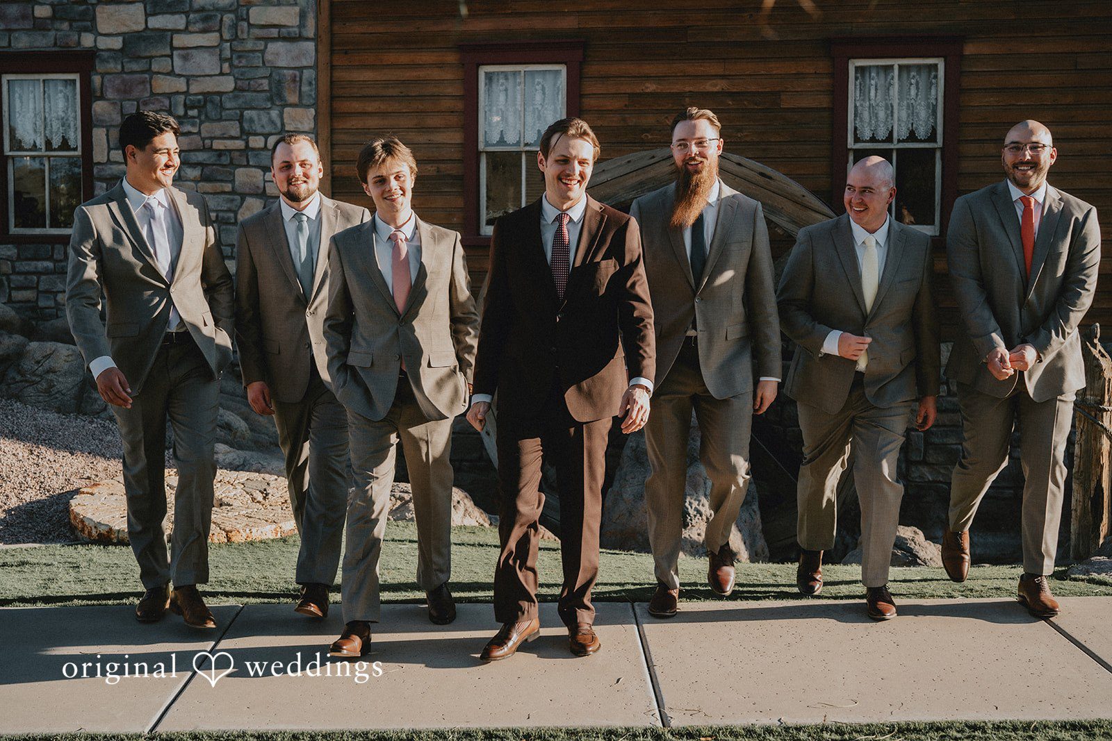 Groom with Groomsmen posing together before ceremony at Shenandoah Mill