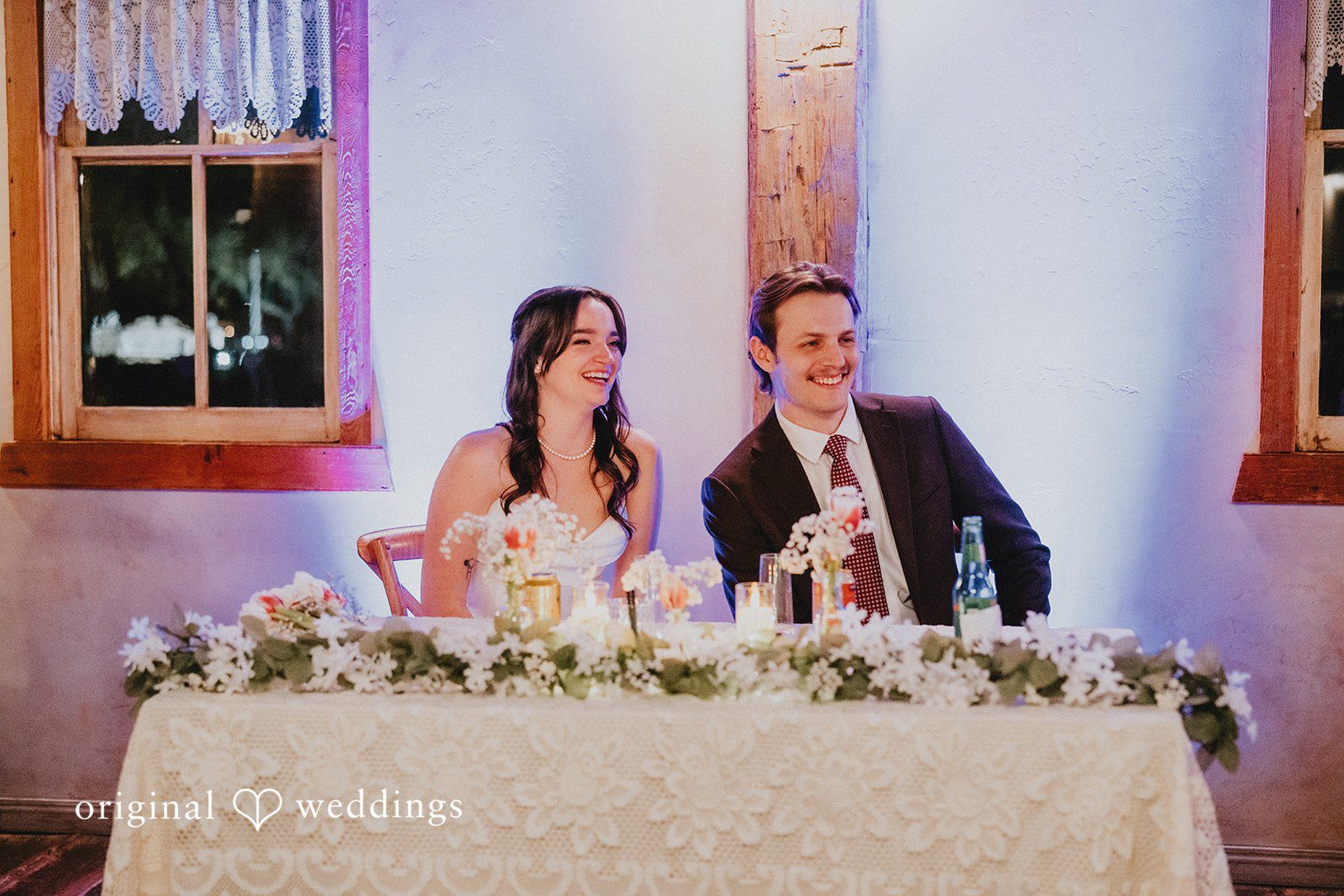 Newlywed couple smiling during their wedding reception at Shenandoah Mill