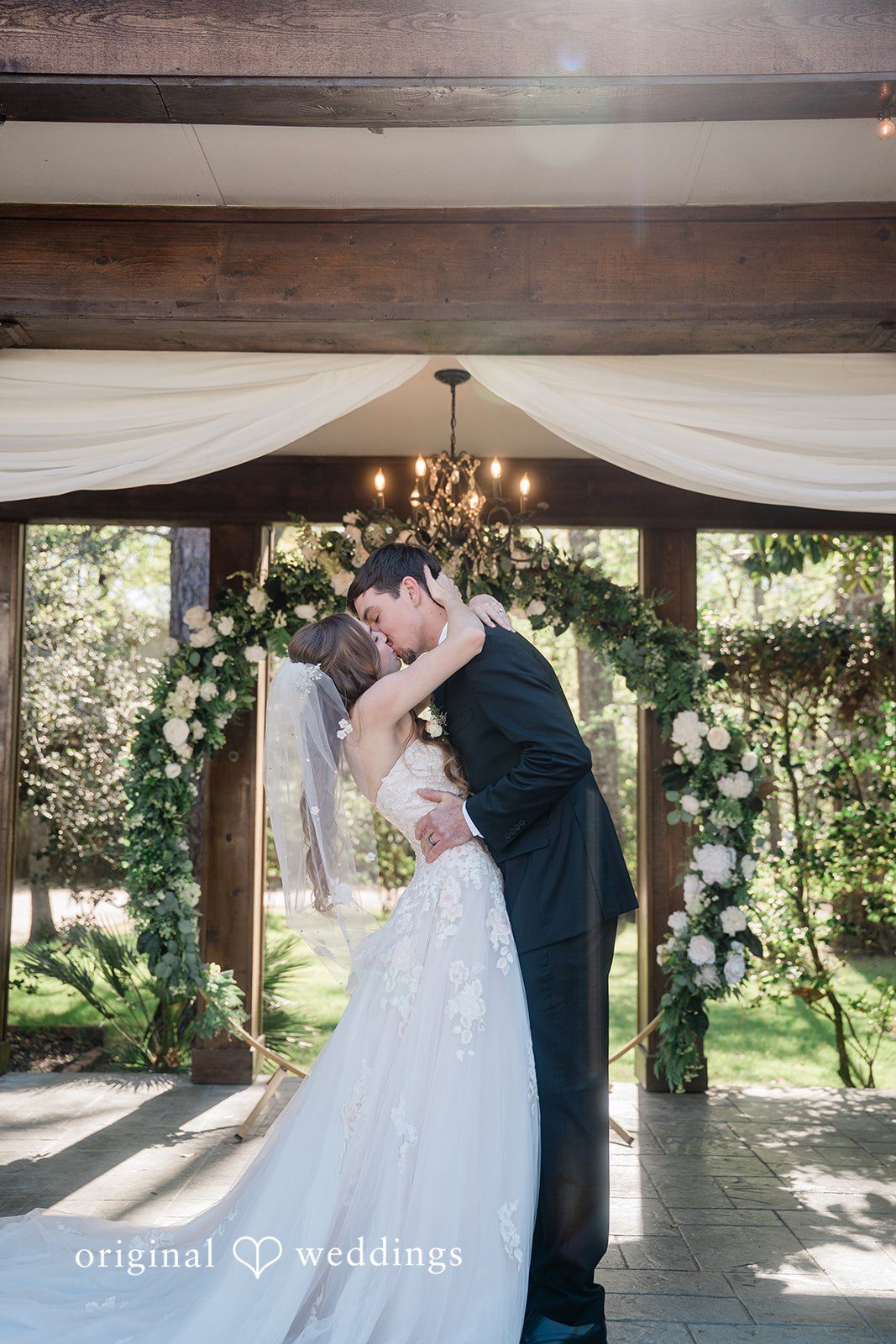 The couple shares their first kiss
