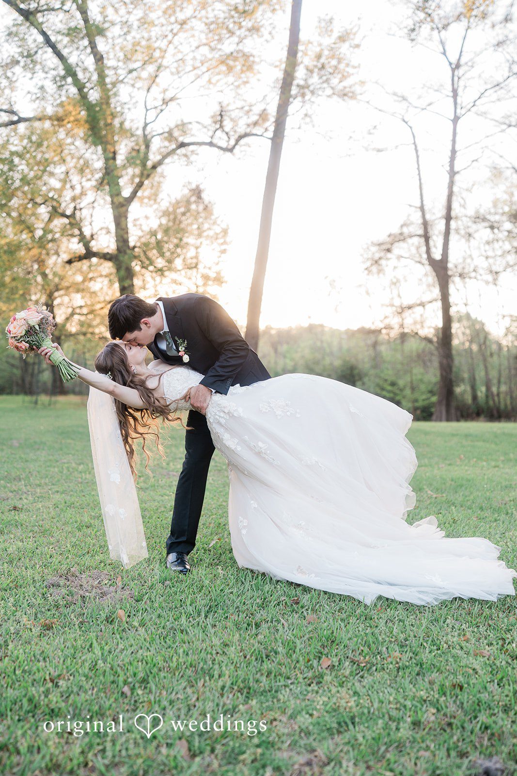 The couple shares a romantic moment at Shirley Acres' outdoor space