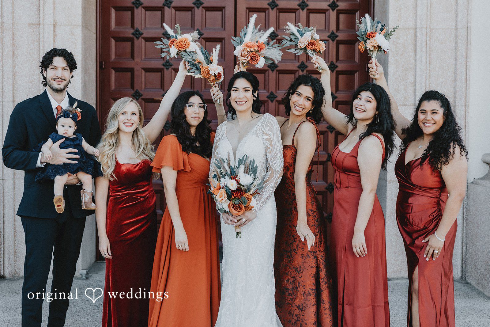 Beautiful picture of bride with bridesmaids holding bouquet