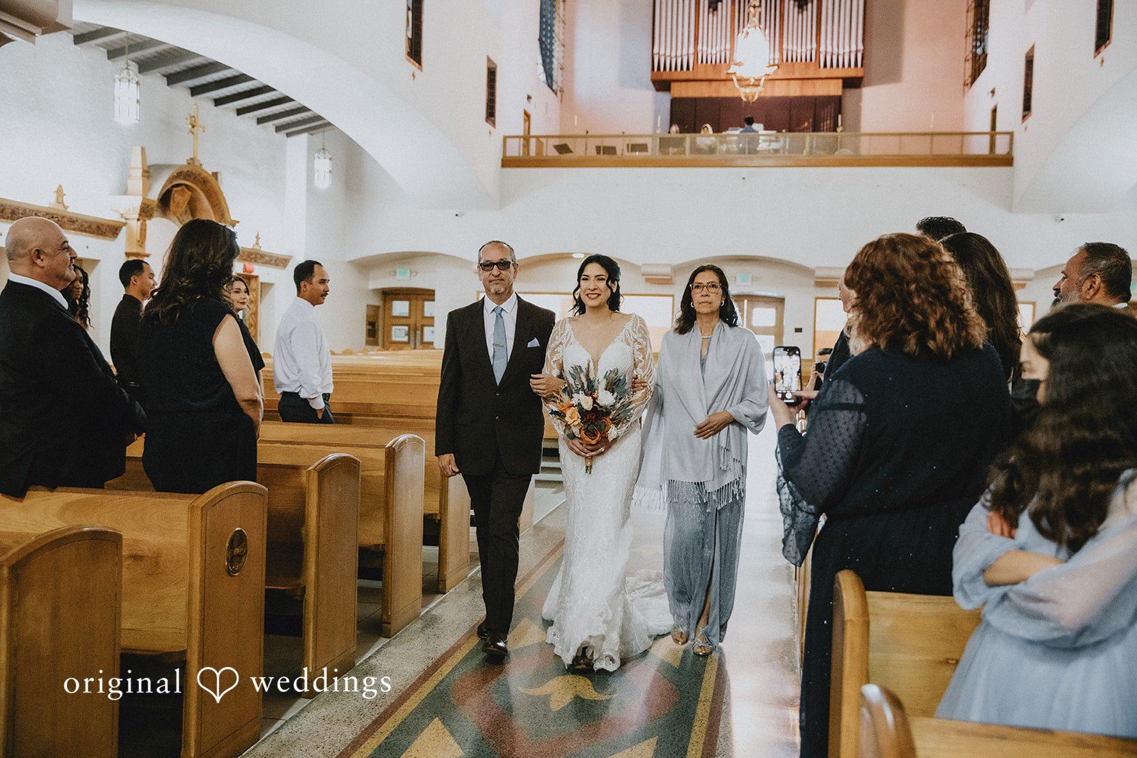 Bride walking down the aisle at Sierra La Verne