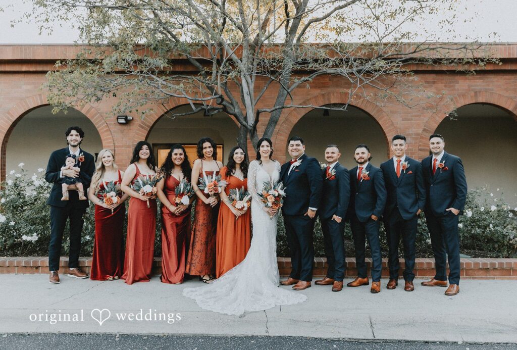 Group photo of couple with bridesmaids and groomsmen at Sierra La Verne