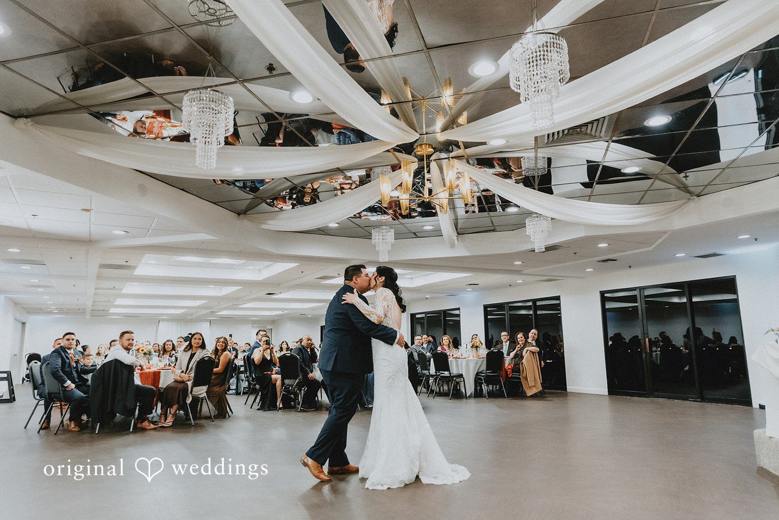 Romantic kiss of couple at dance floor