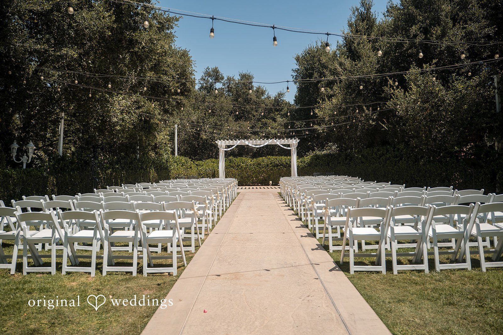Wide view of the outdoor ceremony setup before guests arrive