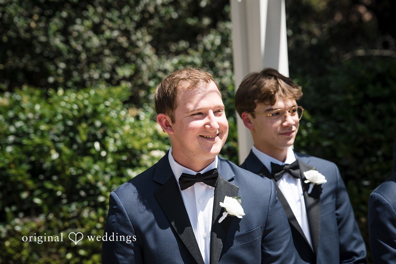 Groom waiting emotionally at the ceremony site before the vows