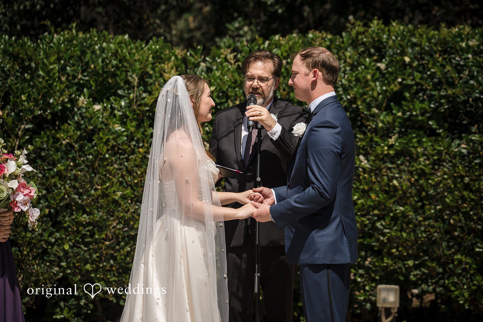 Bride and groom exchanging vows during the ceremony