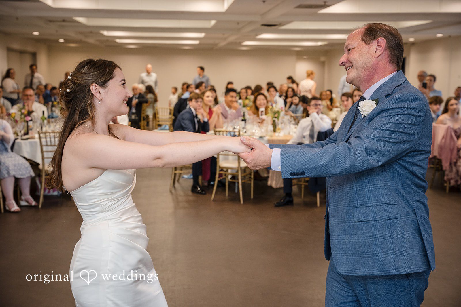 Bride dancing with her father during the reception