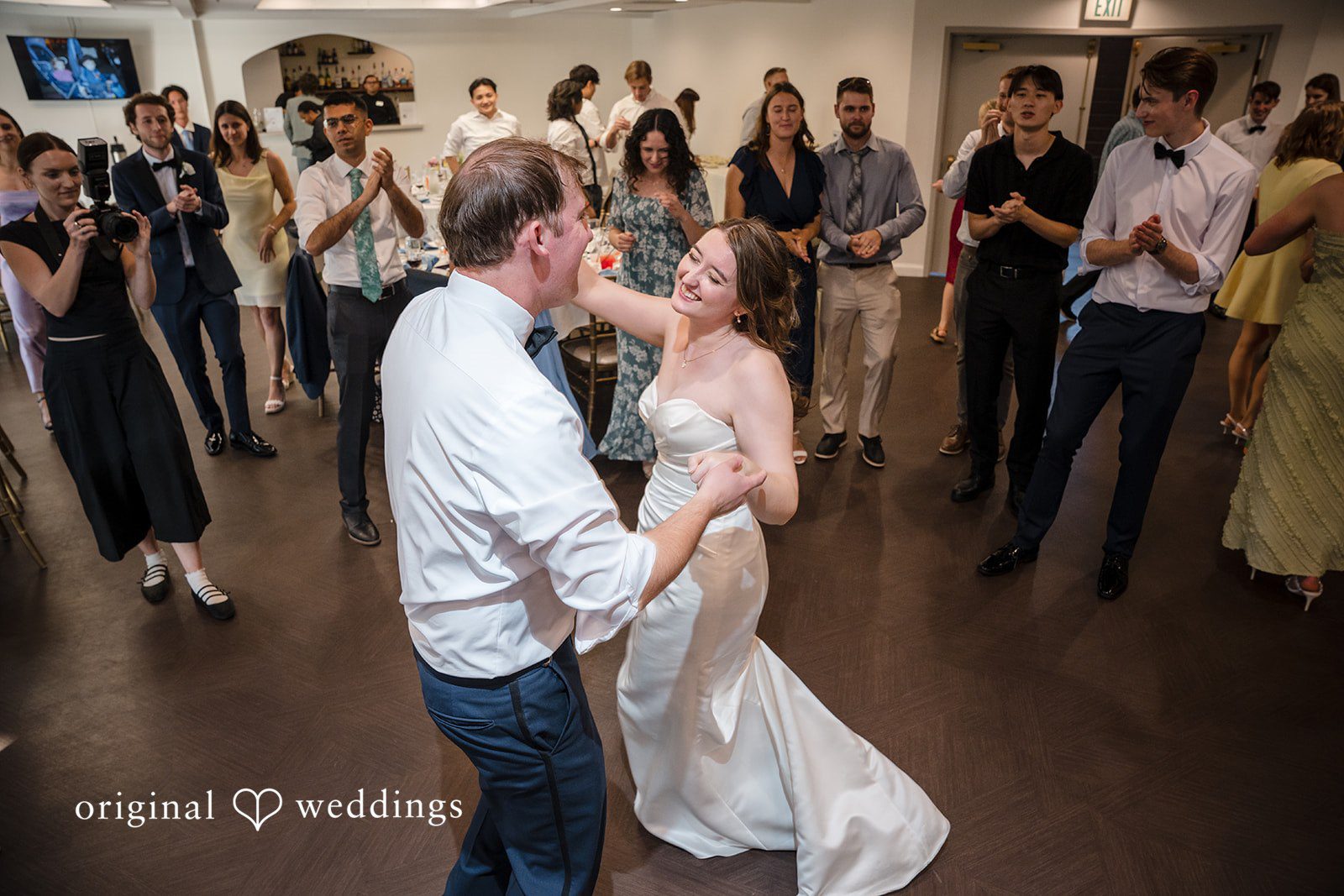 Bride and groom playing games together during the reception
