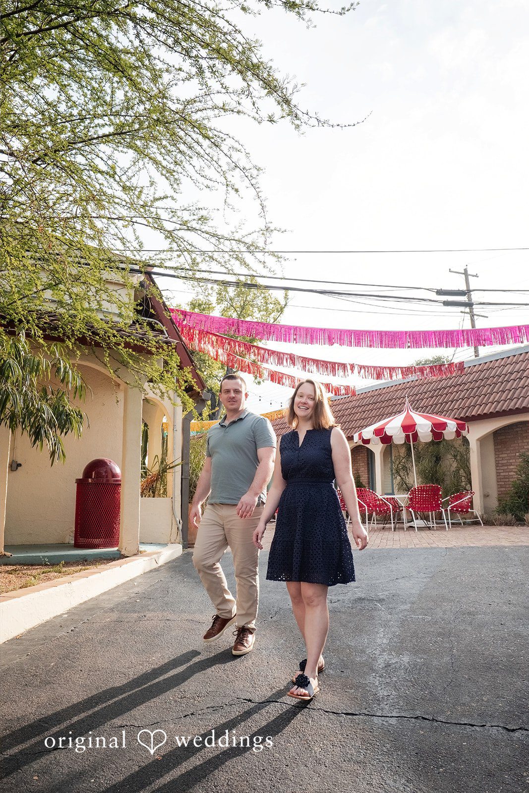 Eric + Kimberly Engaged couple walking together outdoor