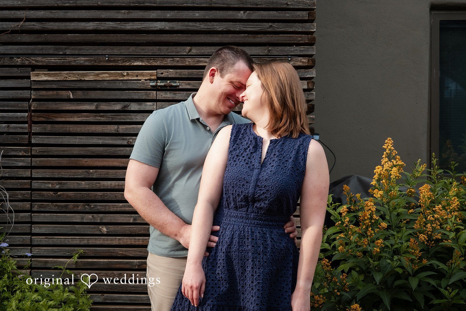 Eric + Kimberly Engaged couple smiling together at South Congress Captured by Austin Engagement Photographers from Original Weddings