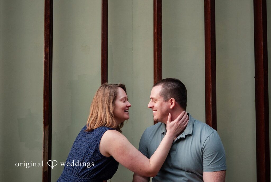 Eric + Kimberly Couple sharing a sweet moment at South Congress captured by Austin engagement photographers from Original Weddings