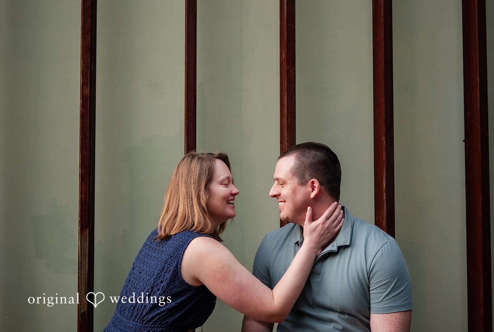 Couple sharing a sweet moment at South Congress captured by Austin engagement photographers from Original Weddings
