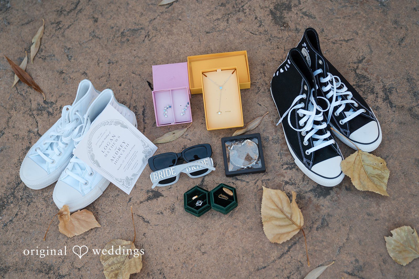 Close-up detail of wedding rings and wedding invitations