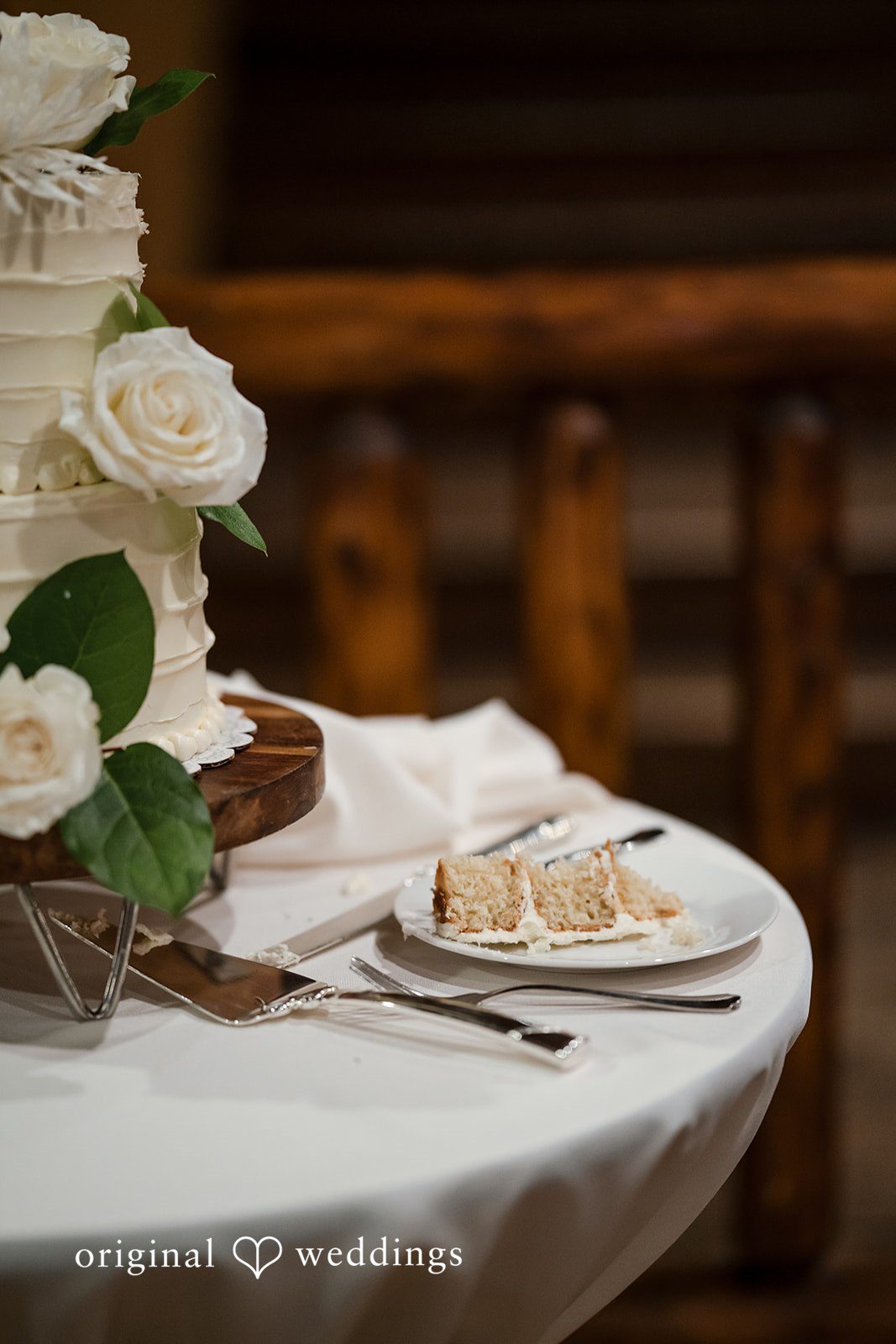 Close-up of a sliced wedding cake during the reception