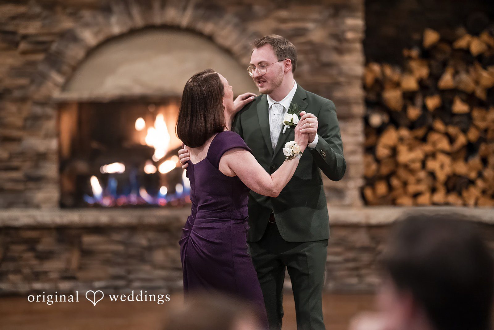 Groom dancing with his mother during the reception