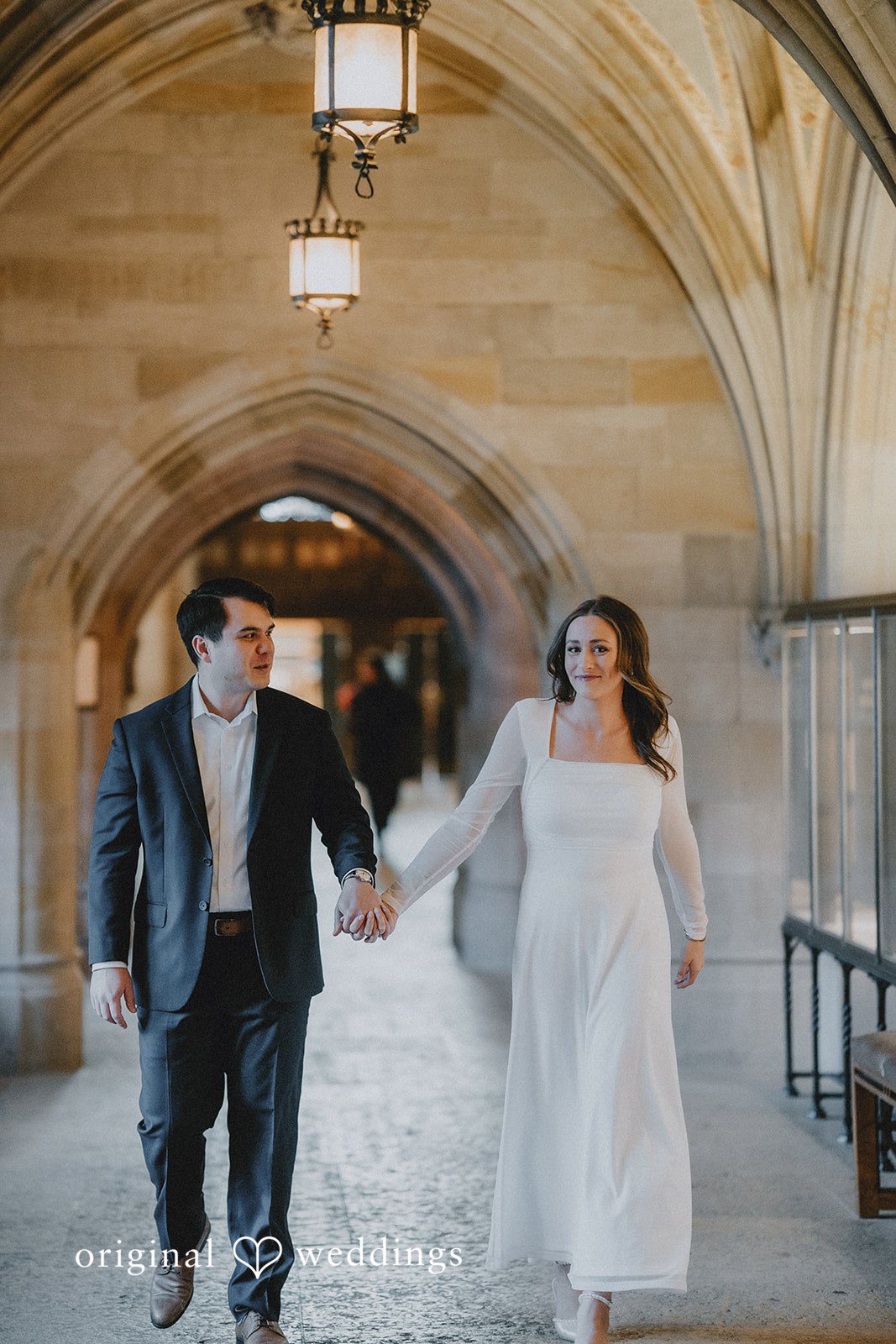 Beautiful picture of couple holding hands at Sterling Library
