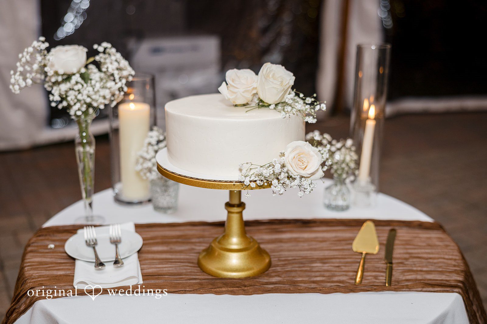 Laura + Nicholas Beautiful wedding cake with elegant floral design and luxury styling