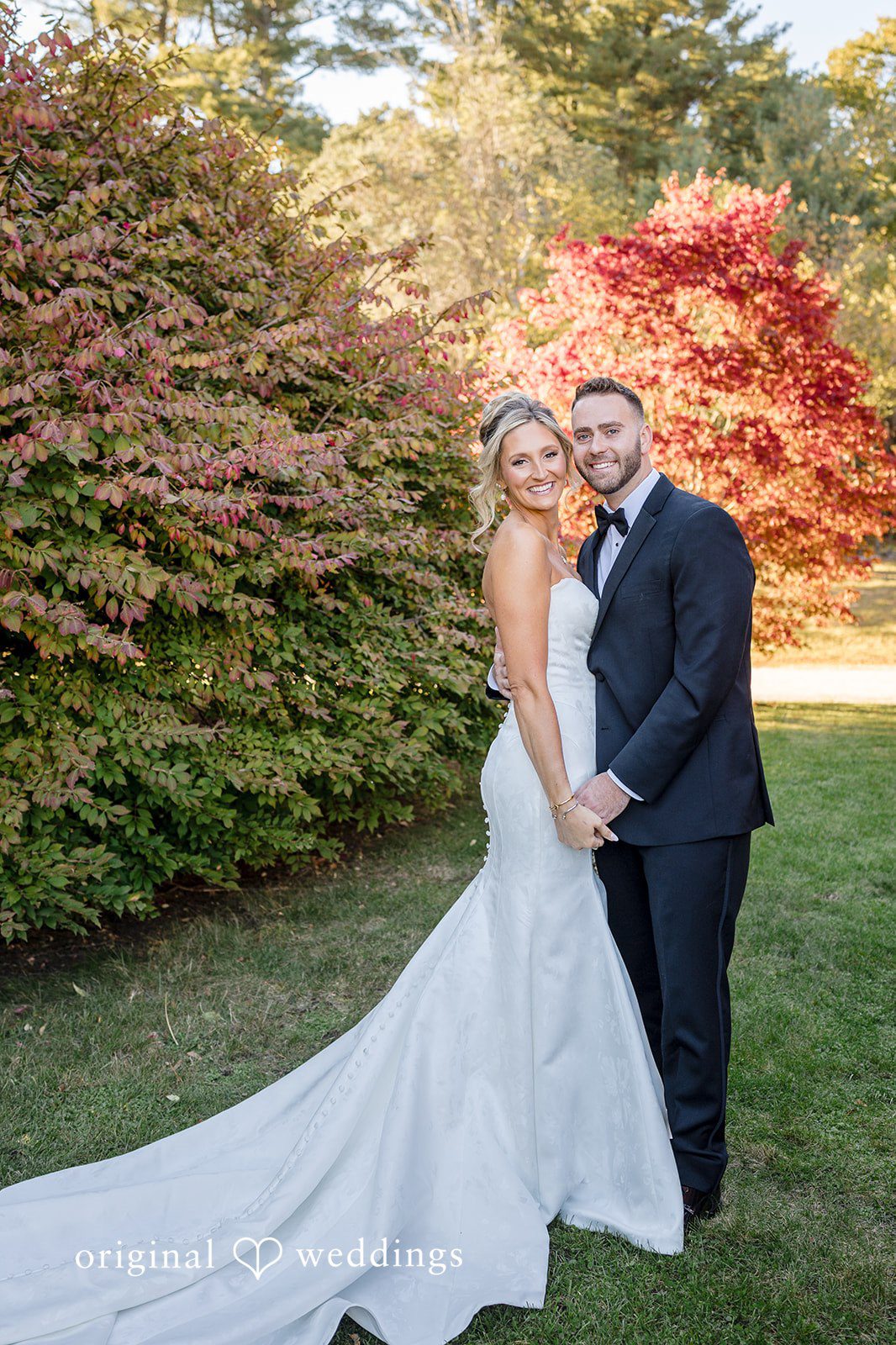 Laura + Nicholas Newlyweds enjoying a romantic outdoor moment