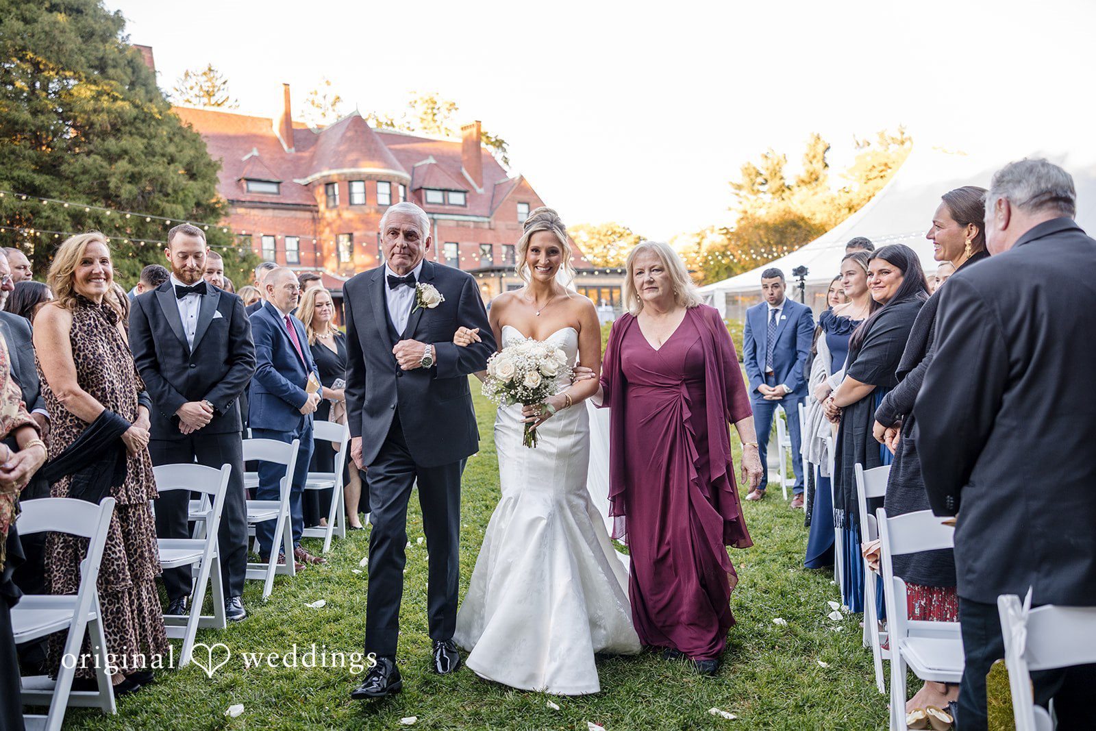 Laura + Nicholas Bride walking down the aisle at Stevens Estate at Osgood Hill