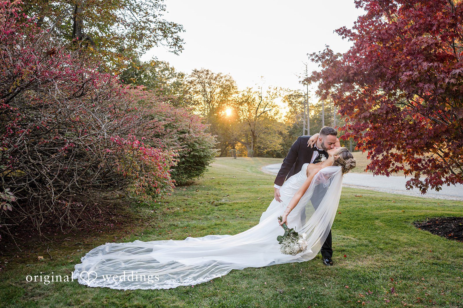 Laura + Nicholas Romantic sunset wedding kiss of couple