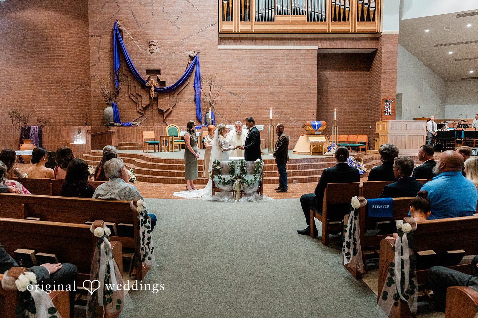 The couple exchanges vows