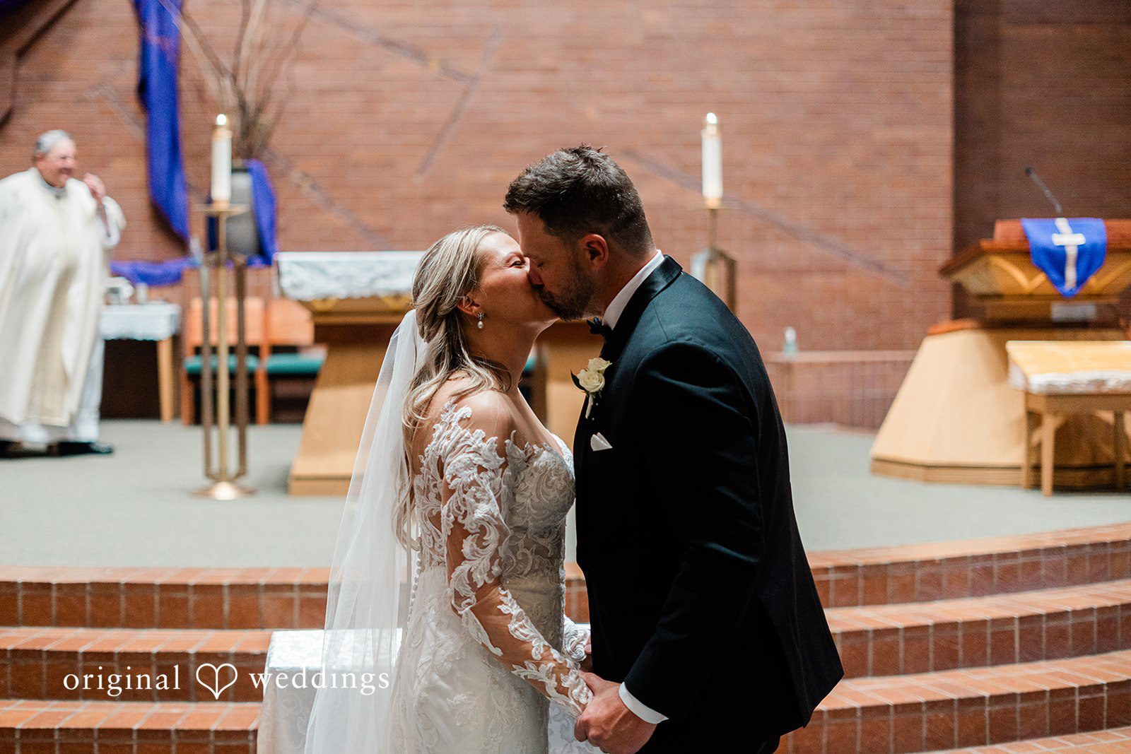 The couple takes their first kiss
