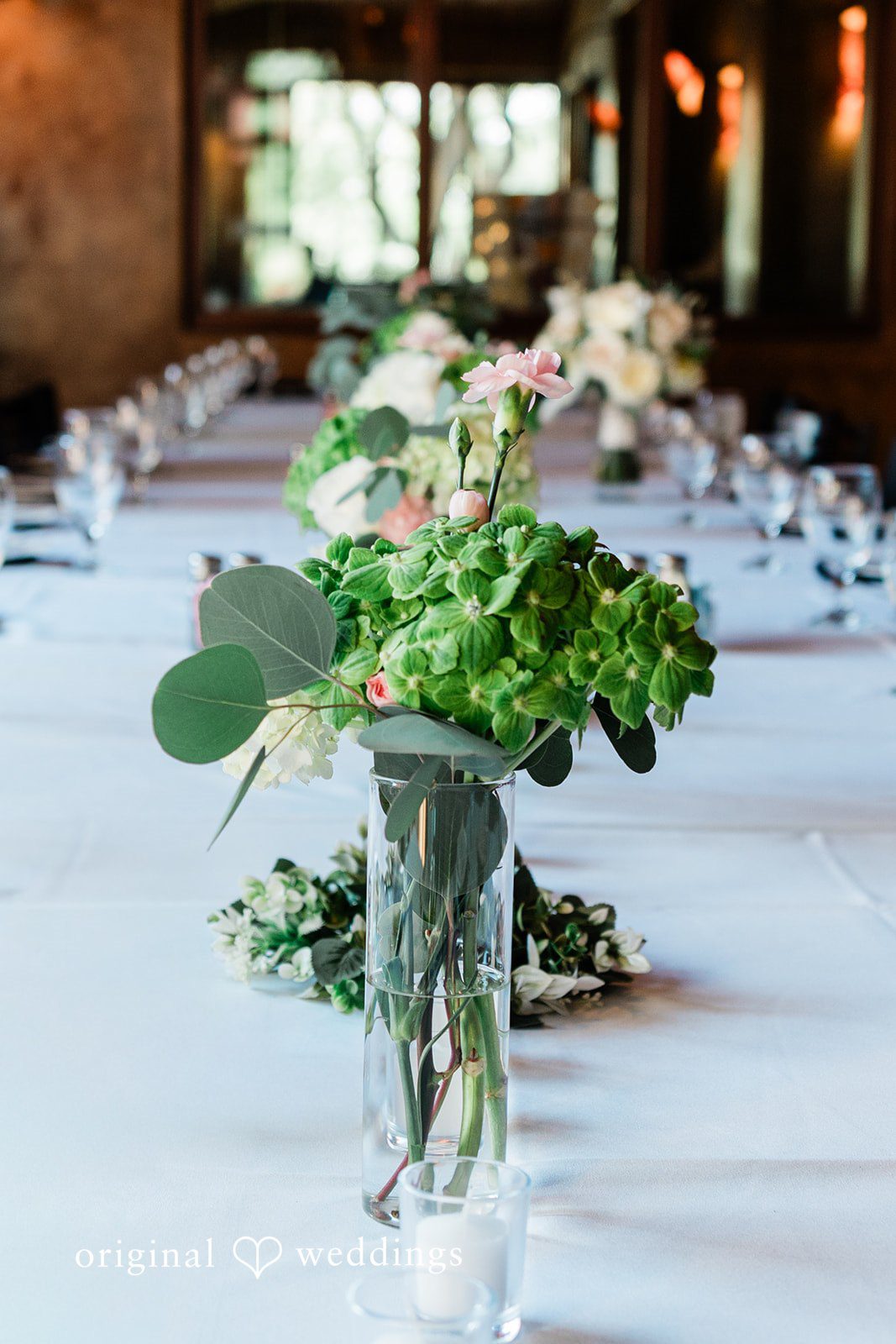 A detail shot of the floral arrangement at the wedding reception
