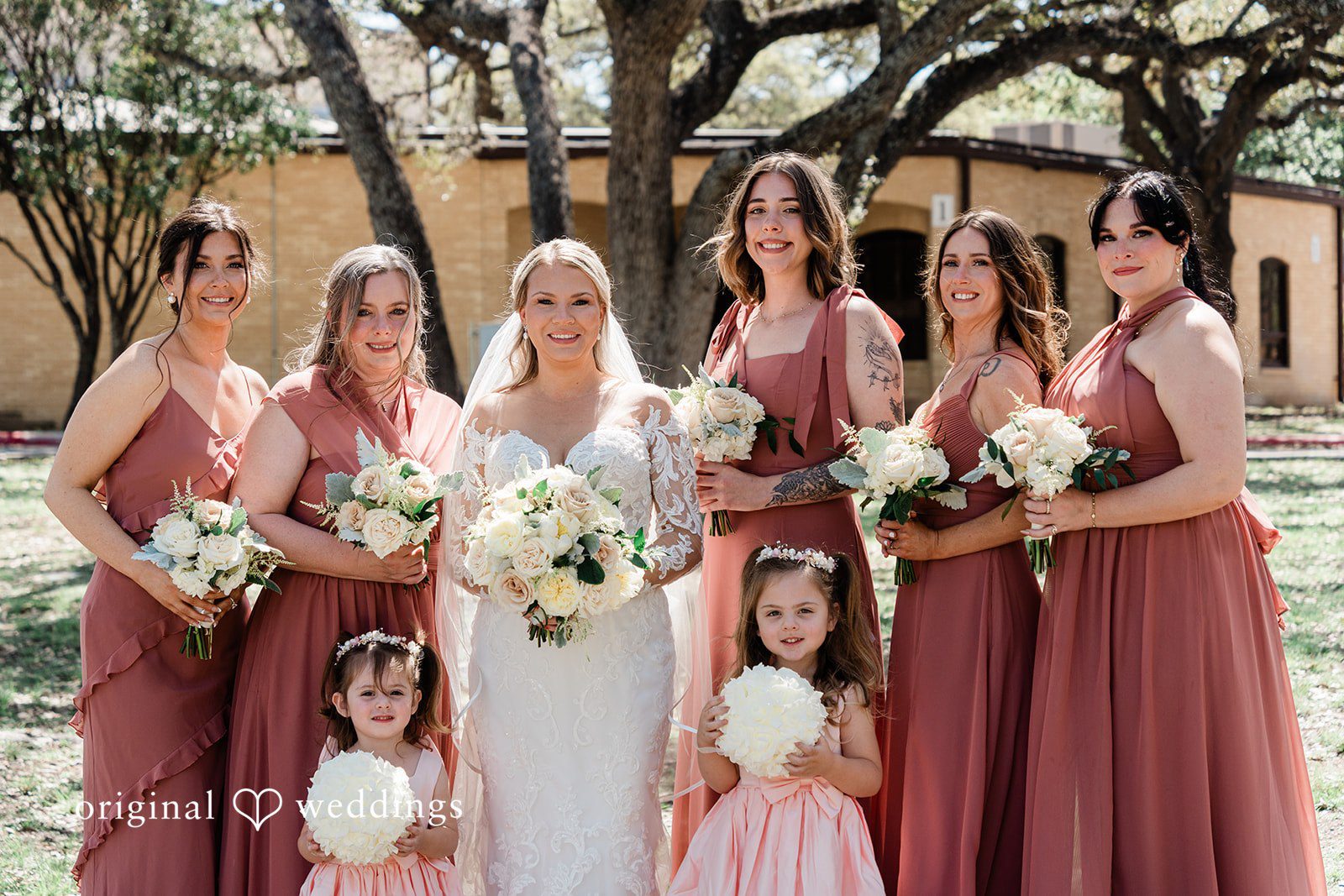 A stunning portrait of the bride and her bridesmaids