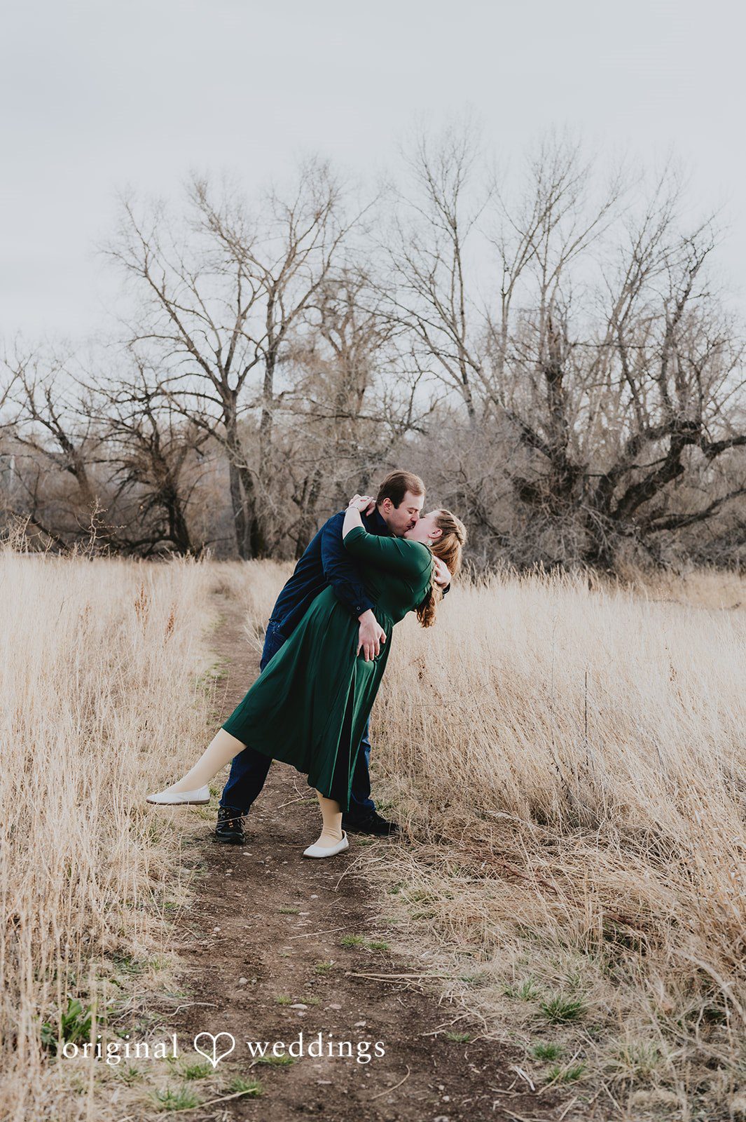 Romantic kiss moment of couple at Stone House photo session