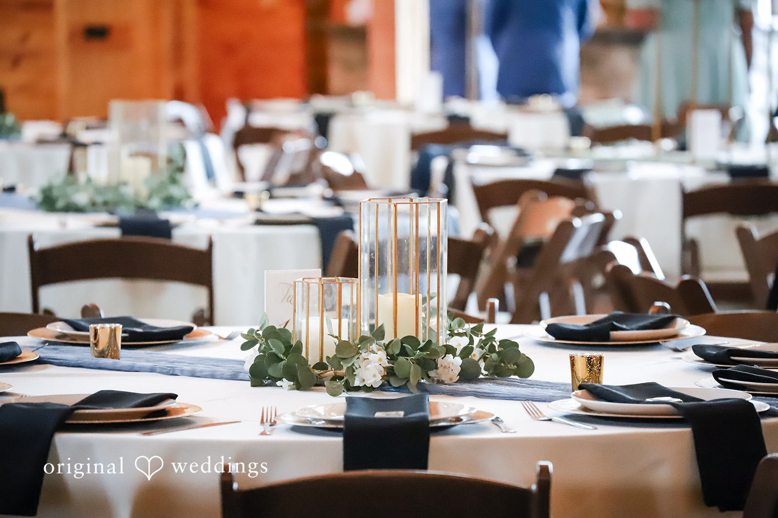 Katrena + Ryan Reception tables decorated and prepared for the wedding celebration