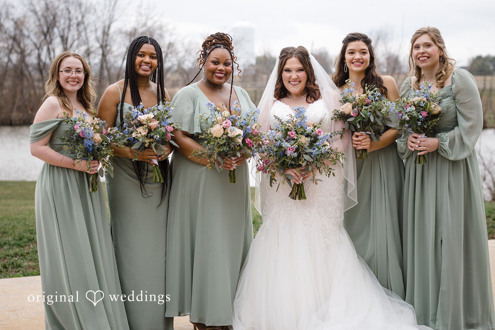 Katrena + Ryan Bride posing with bridesmaids before the ceremony