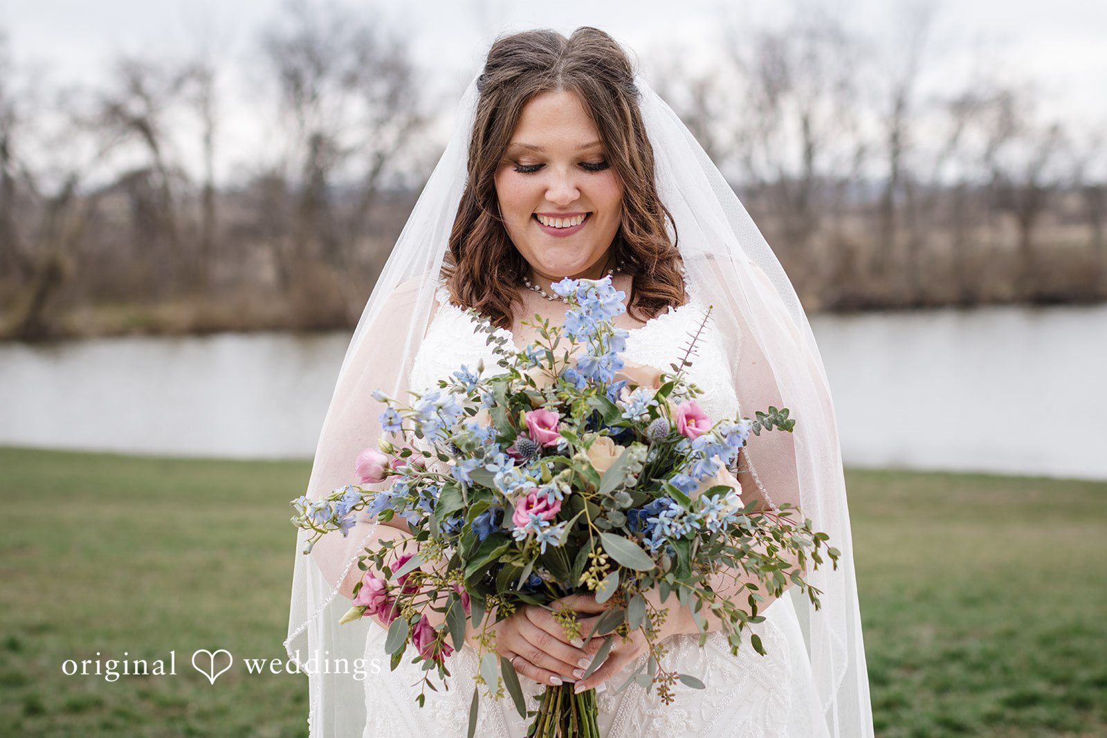 Katrena + Ryan Bridal portrait holding a bouquet before the ceremony
