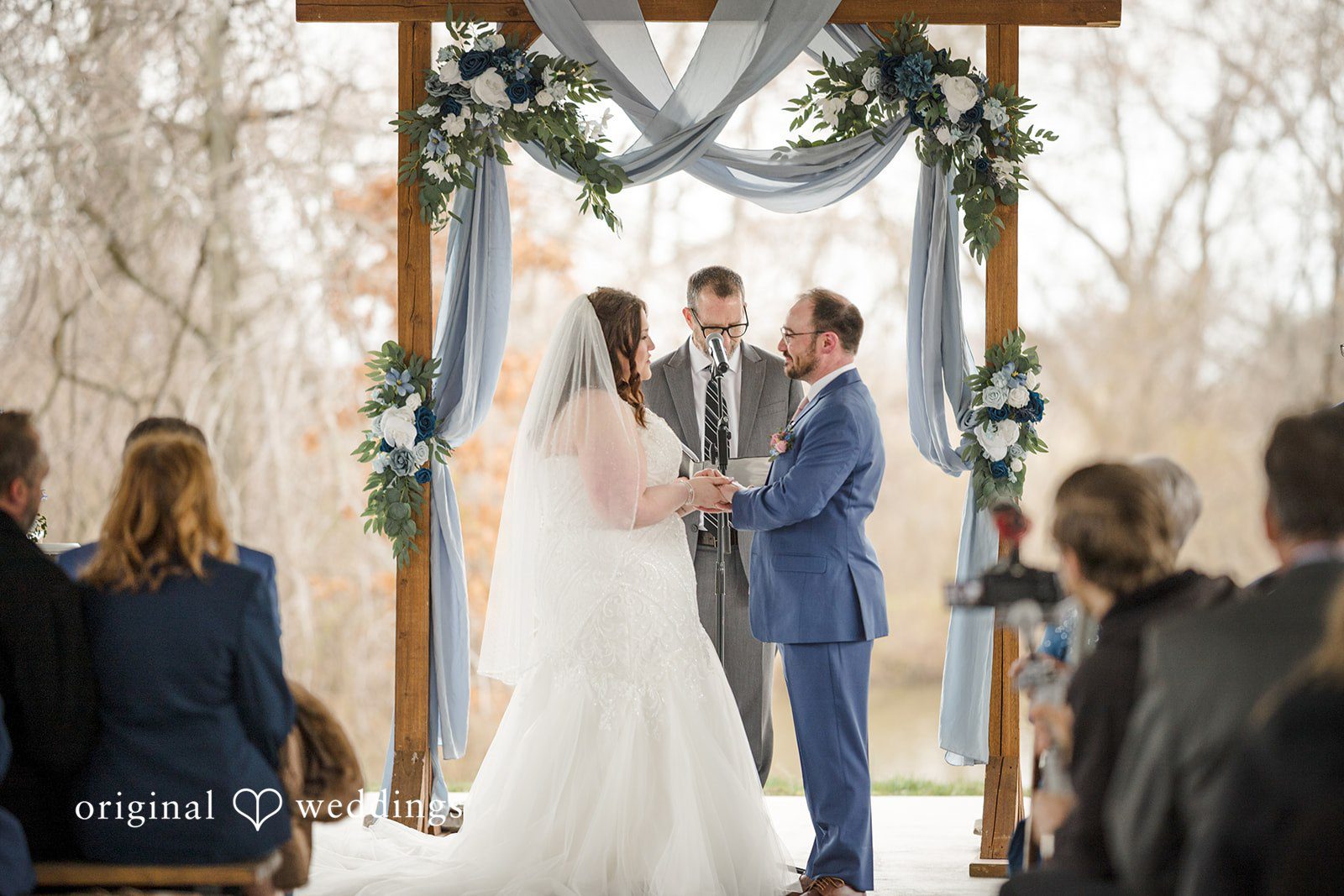 Katrena + Ryan Couple exchanging vows during the wedding ceremony