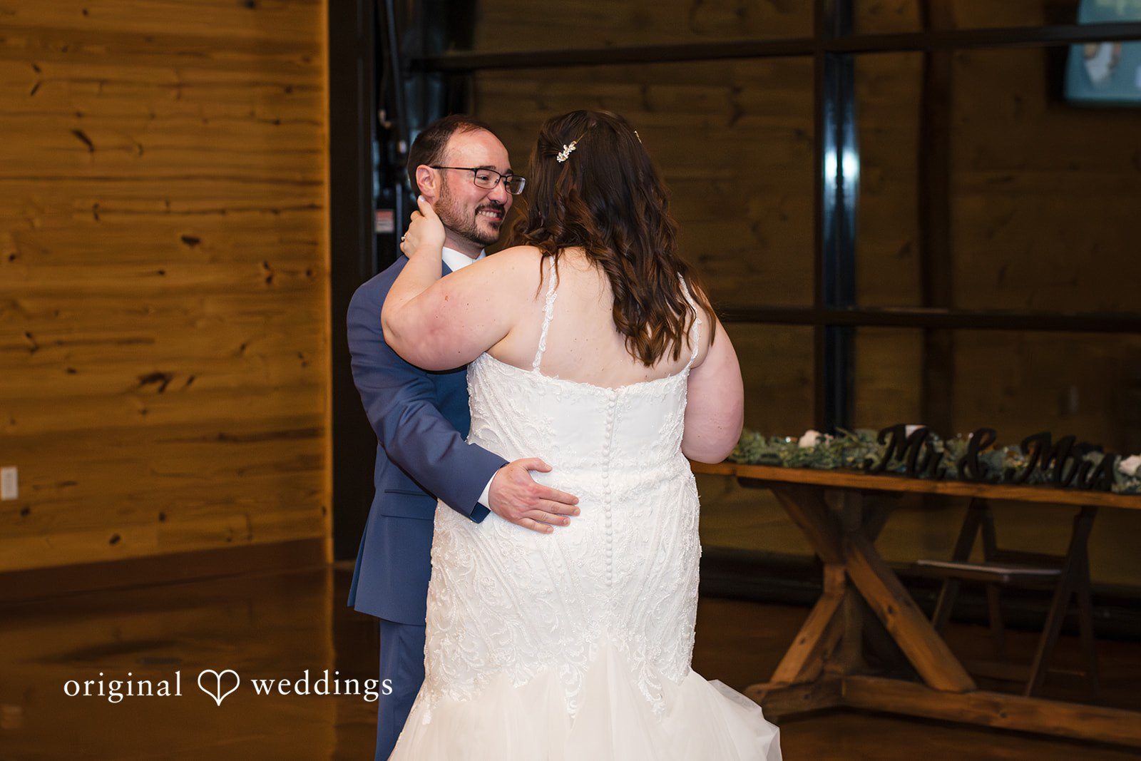 Katrena + Ryan Bride and groom sharing their first dance together