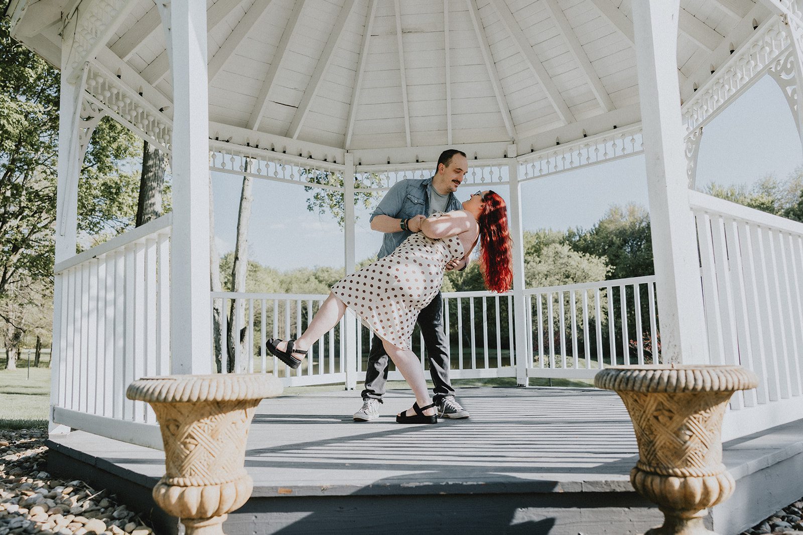A romantic portrait of the couple in the Gazebo