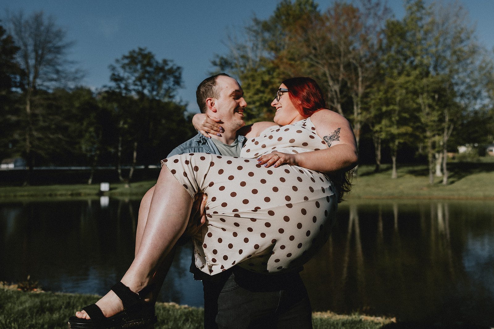 The groom carries the bride