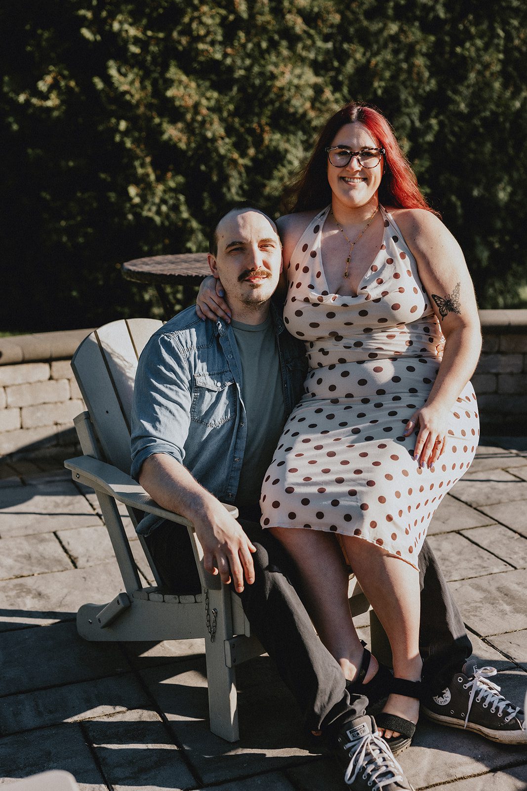 A romantic seated portrait of the couple