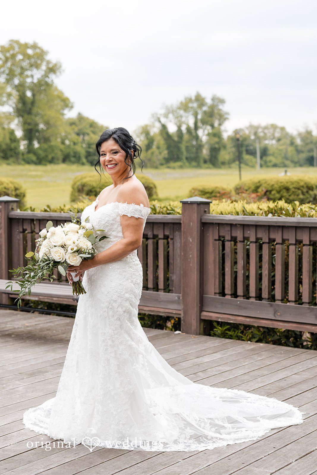 Elegant bridal portrait with flowers at Swan Harbor Farm