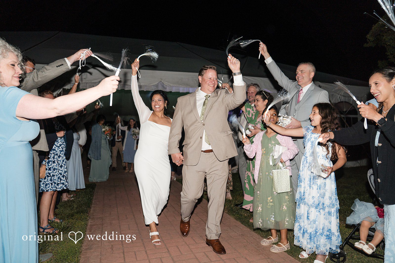 Romantic bride and groom reception exit at Swan Harbor Farm