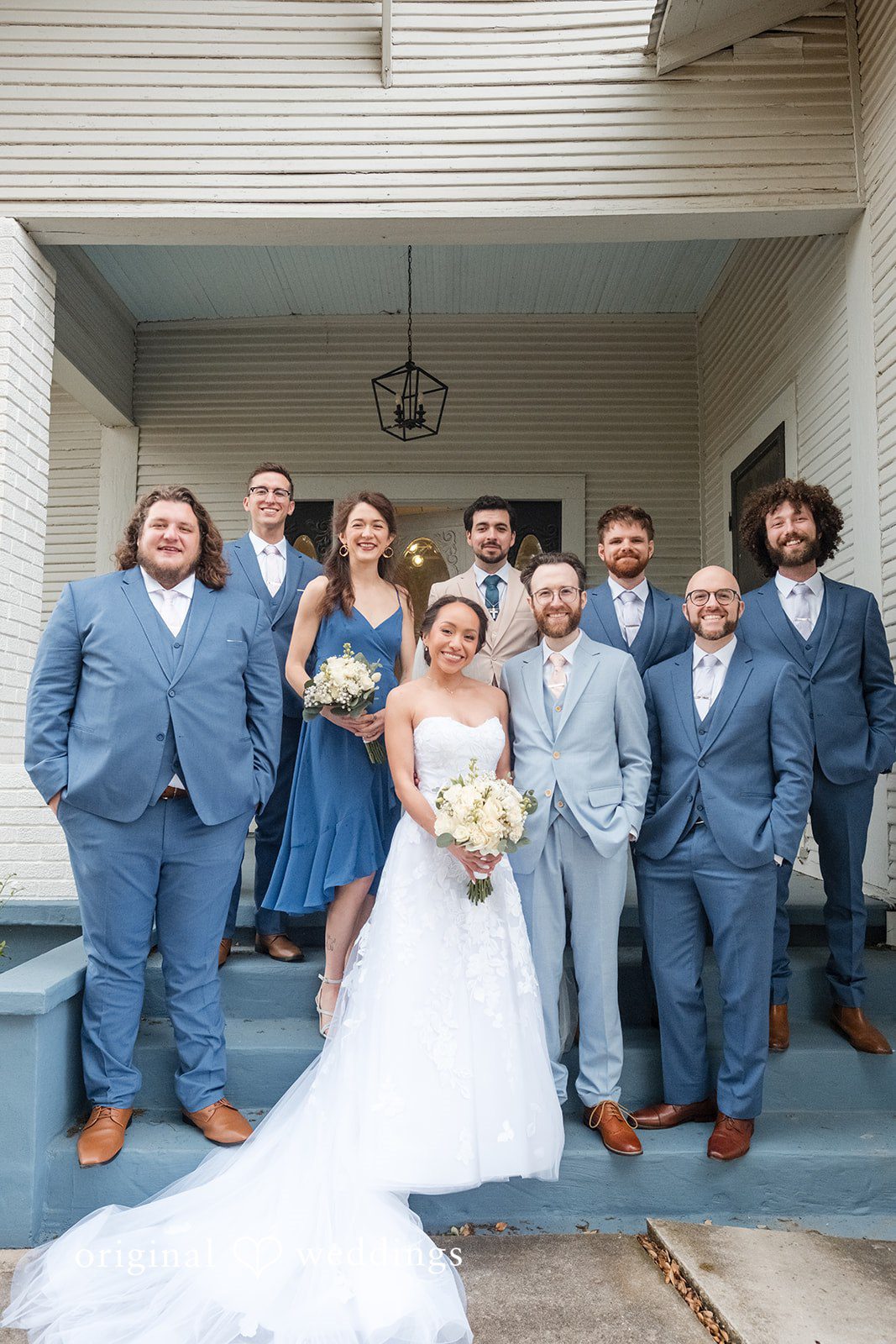 Dana + Daniel Wedding party group portrait with bride and groom outdoors