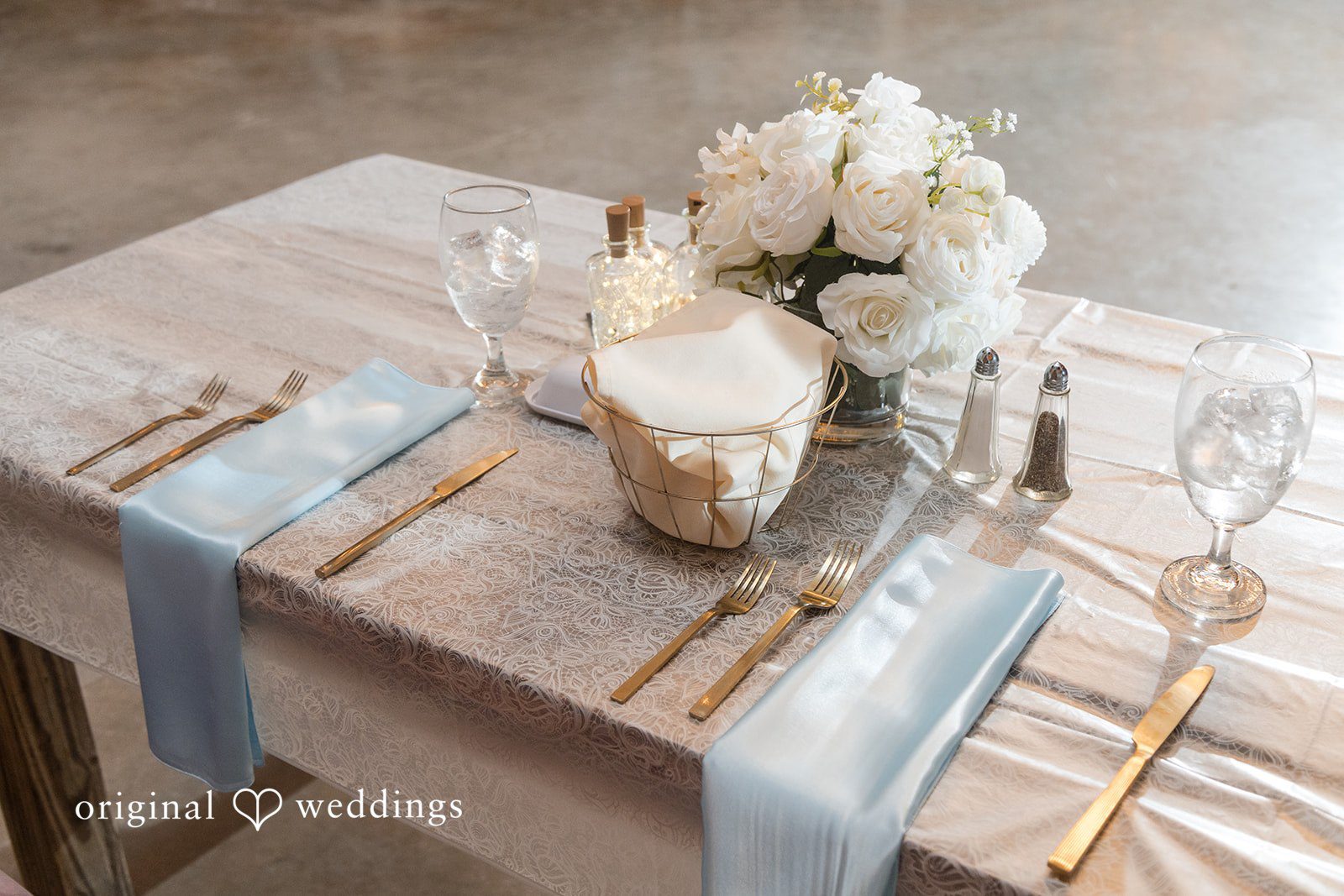 Dana + Daniel Bride and groom reception table decorated with romantic details