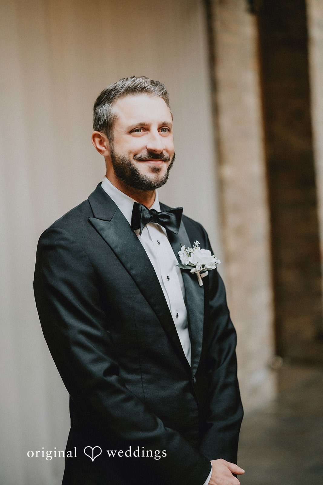 The groom anticipates the bride’s entrance